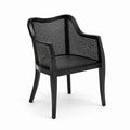 Chaise en bois avec dossier en rotin et assise en similicuir noir